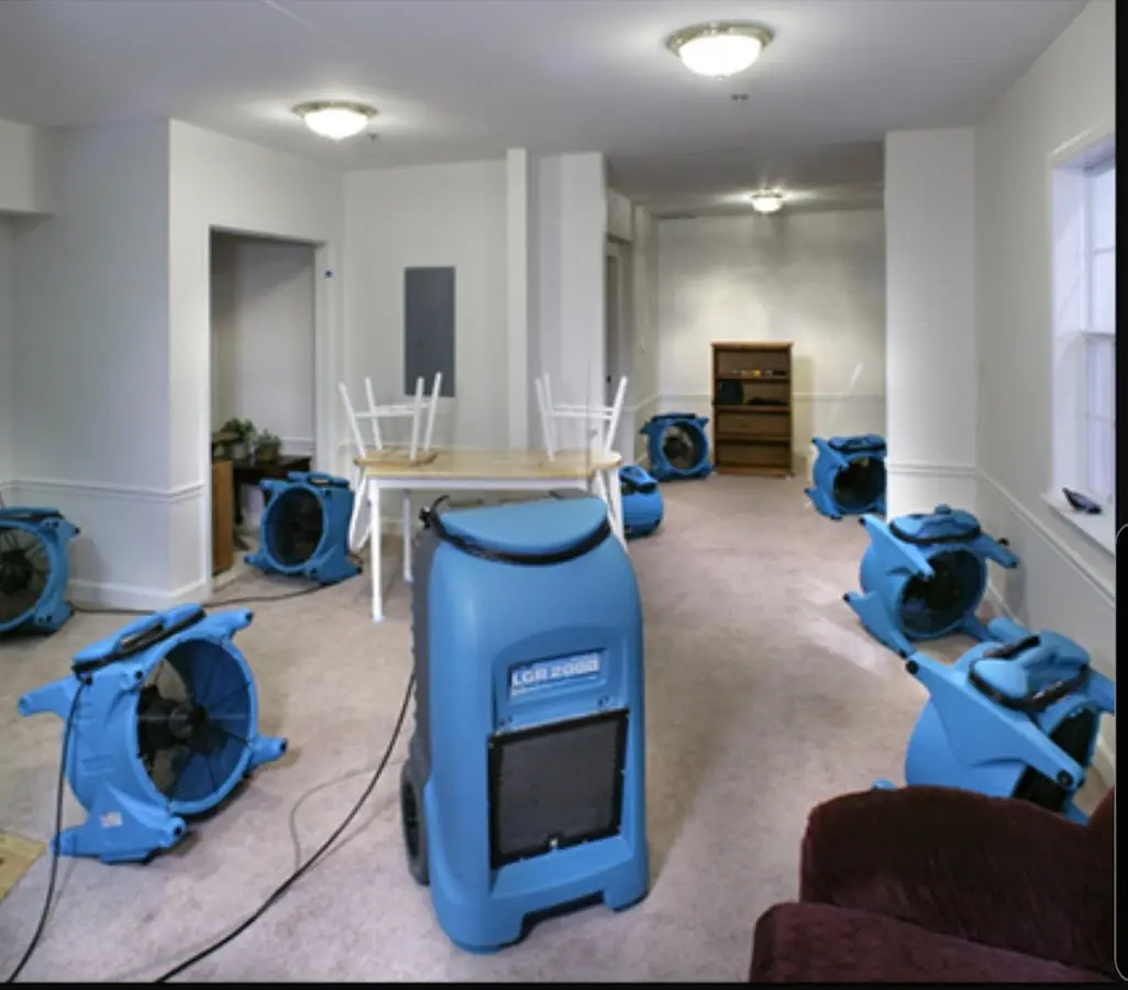 Air movers and dehumidifier setup for Water Damage Restoration in Brookhaven